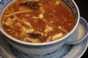 A3 Hot & Sour Thong Szechuan soup with bamboo, carrots, chicken, Chinese mushrooms and pickled radish.