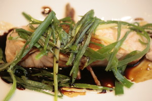 C5 Guang Shi Qingzheng Quiyu Steamed filet of salmon with ginger, soy sauce, and spring onion.