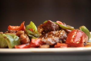 G7 Hoi Kwo Niu Rou Beef in soy paste sauce, Szechuan peppers, paprika, onions and bamboo.
