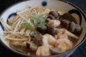 J1 Kwai Tiou Kung Spicy Thai rice noodle soup with prawns, mushrooms and lime leaves.